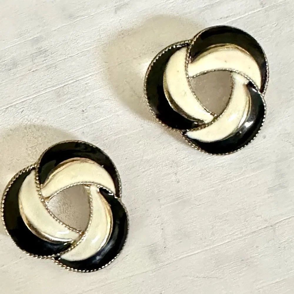 Black cream enamel swirl post earrings